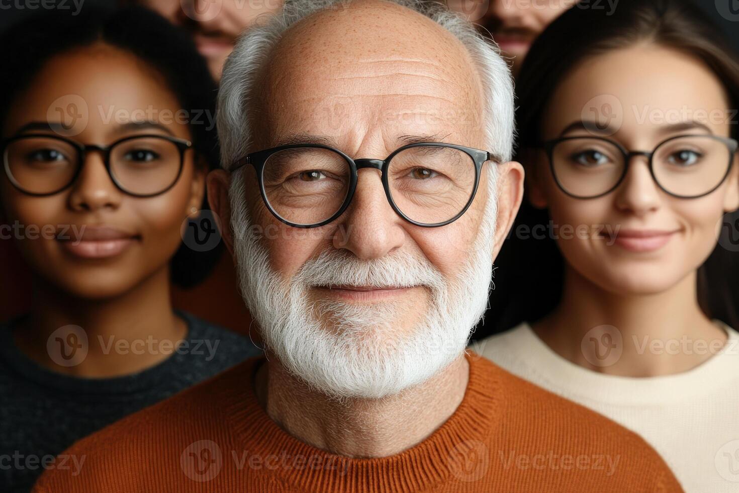 Diverse group of people with glasses smiling and posing for a close-up picture indoors photo