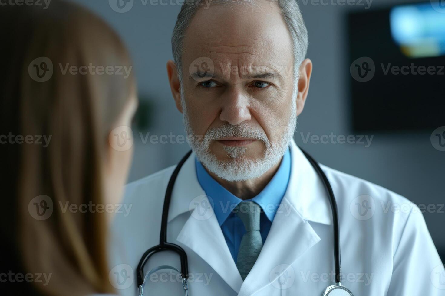 Experienced doctor discussing patients diagnosis in a modern medical office setting photo