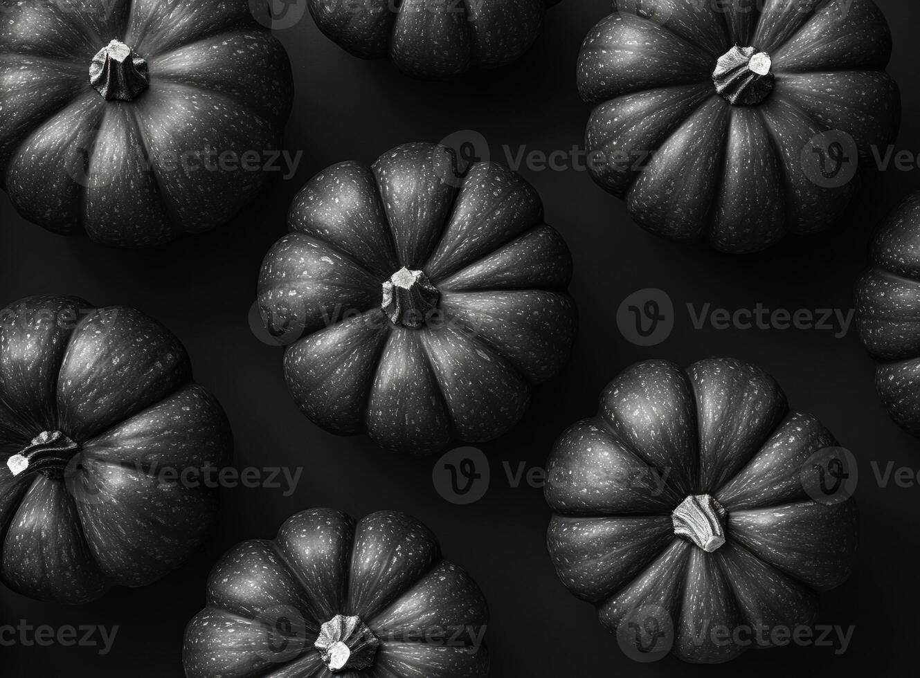 Spooky black pumpkins creating a beautiful halloween pattern on a dark background, perfect for seasonal projects photo