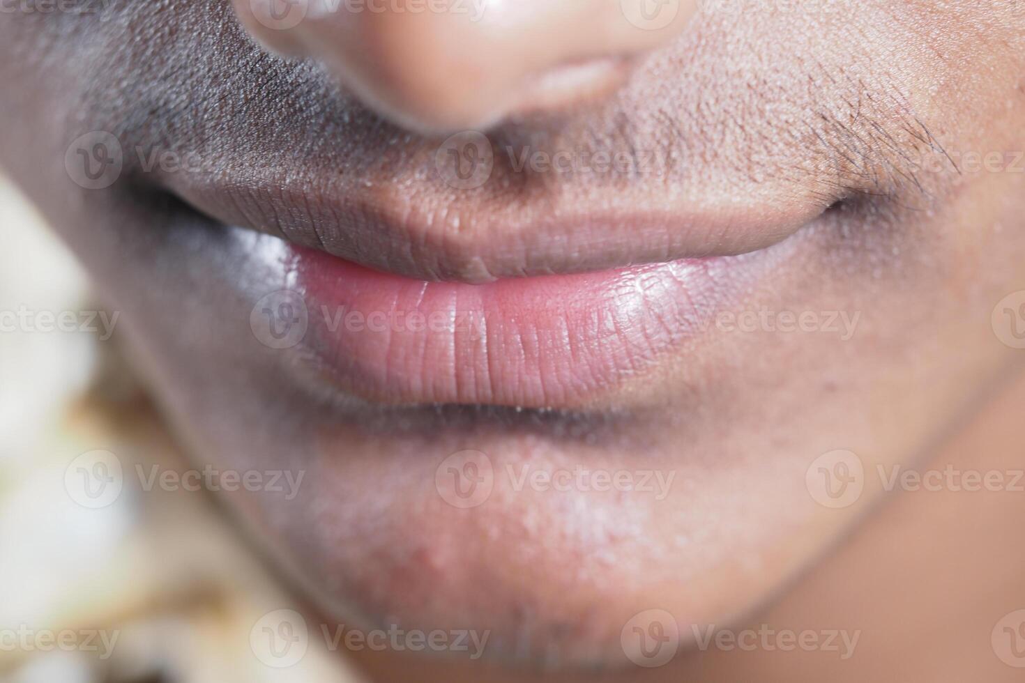 Close-up view of a person's lips during a cultural celebration photo