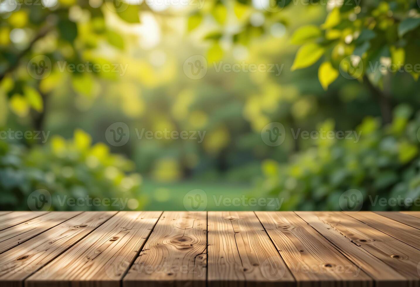 Empty Wooden Tabletop Over Blurred Fresh Green Leaves Swaying in Soft Golden Light photo