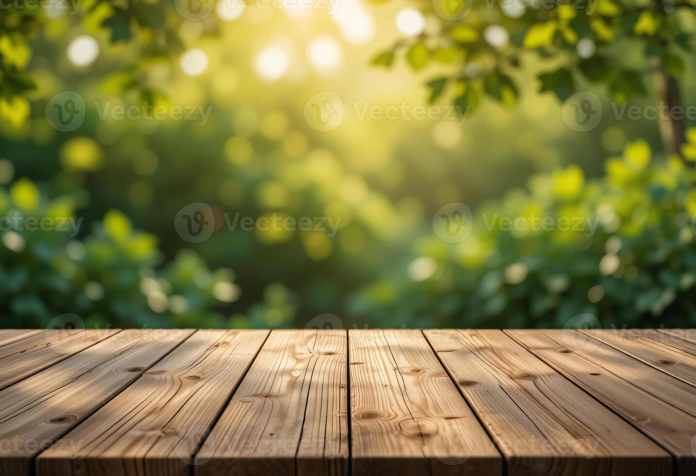 Empty Wooden Tabletop with Blurred Green Leaves Swaying in Soft Golden Light photo