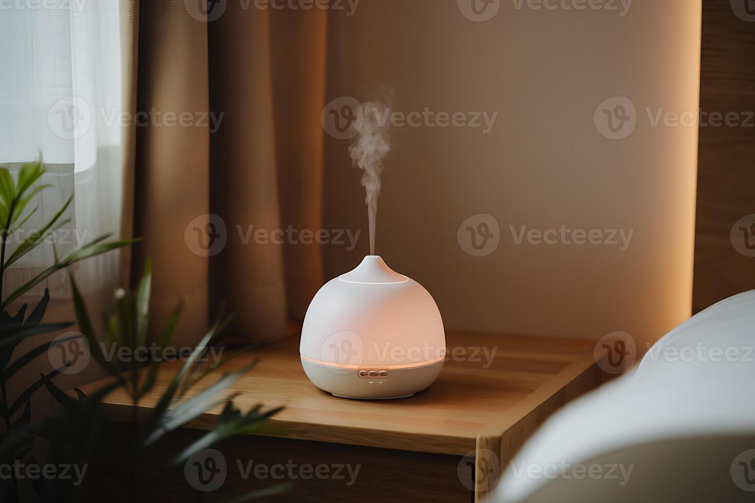 A white aroma diffuser is placed on a wooden table in a bedroom photo