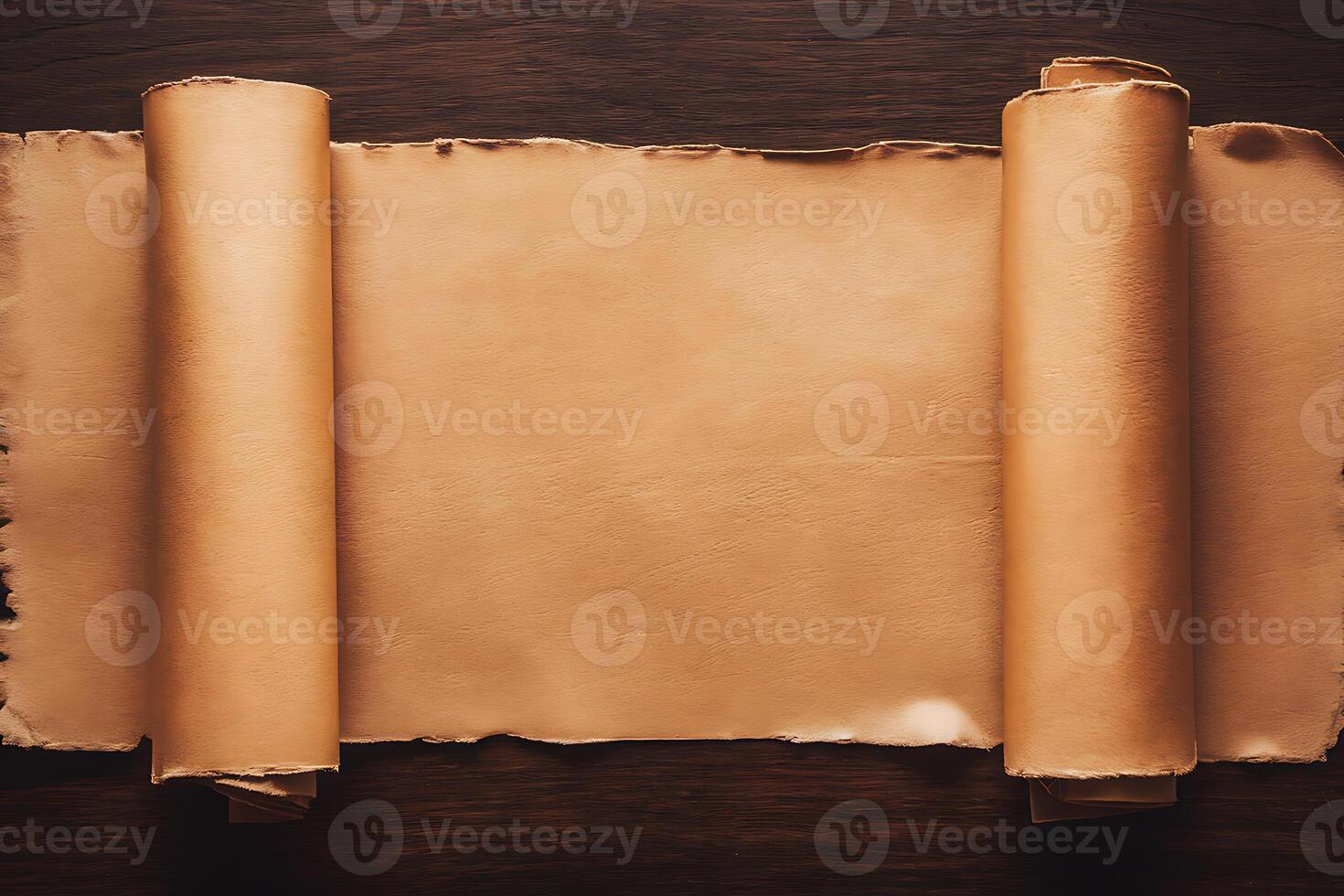 Old parchment scroll on wooden table photo
