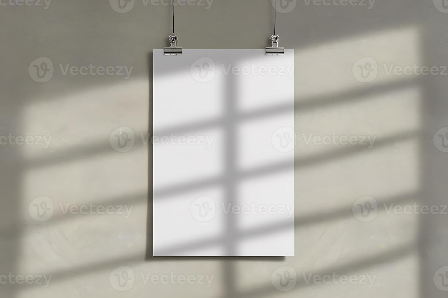 Blank White Poster Mockup Hanging on Beige Wall with Shadow photo