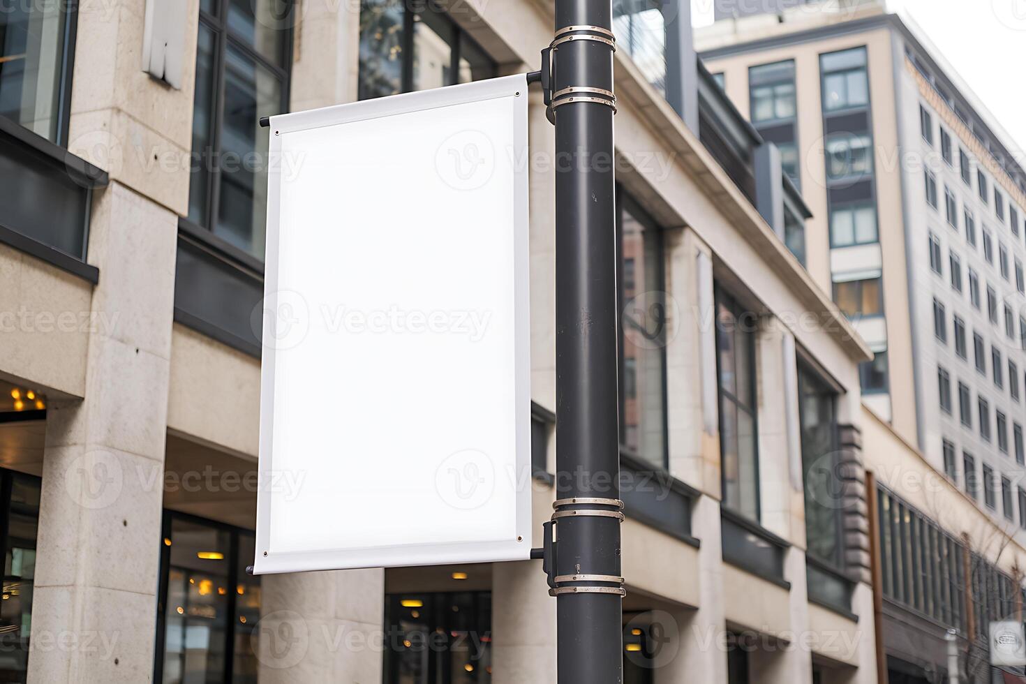 Blank White Billboard Attached to a Modern City Lamppost photo