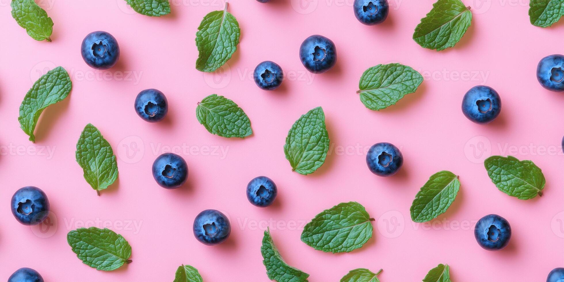 Ultra realistic minimalistic flat lay of blueberries and mint leaves on pink background for creative design photo