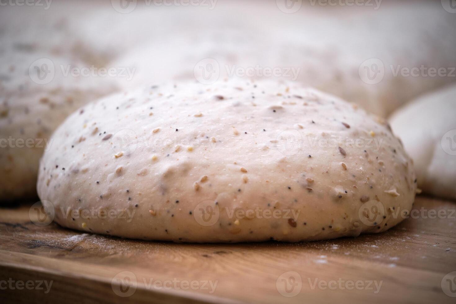 A close up of a bunch of bread on a table photo