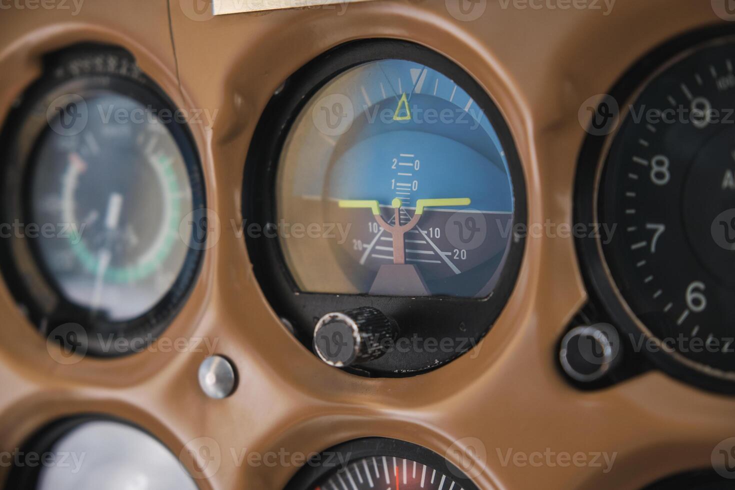An airplane cockpit with many gauges. Closeup photo