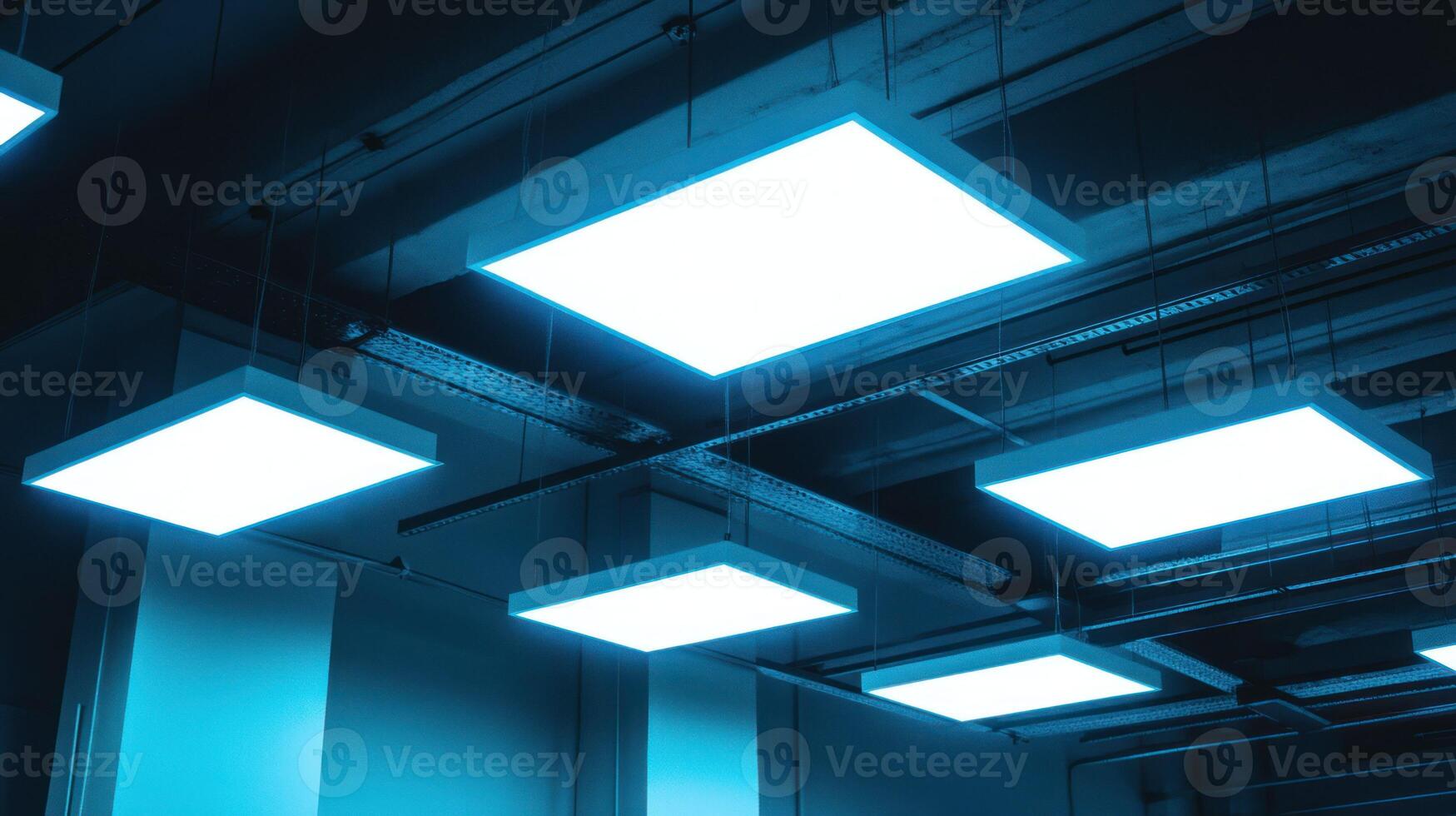 Modern ceiling lights create a luminous and atmospheric blue glow. photo