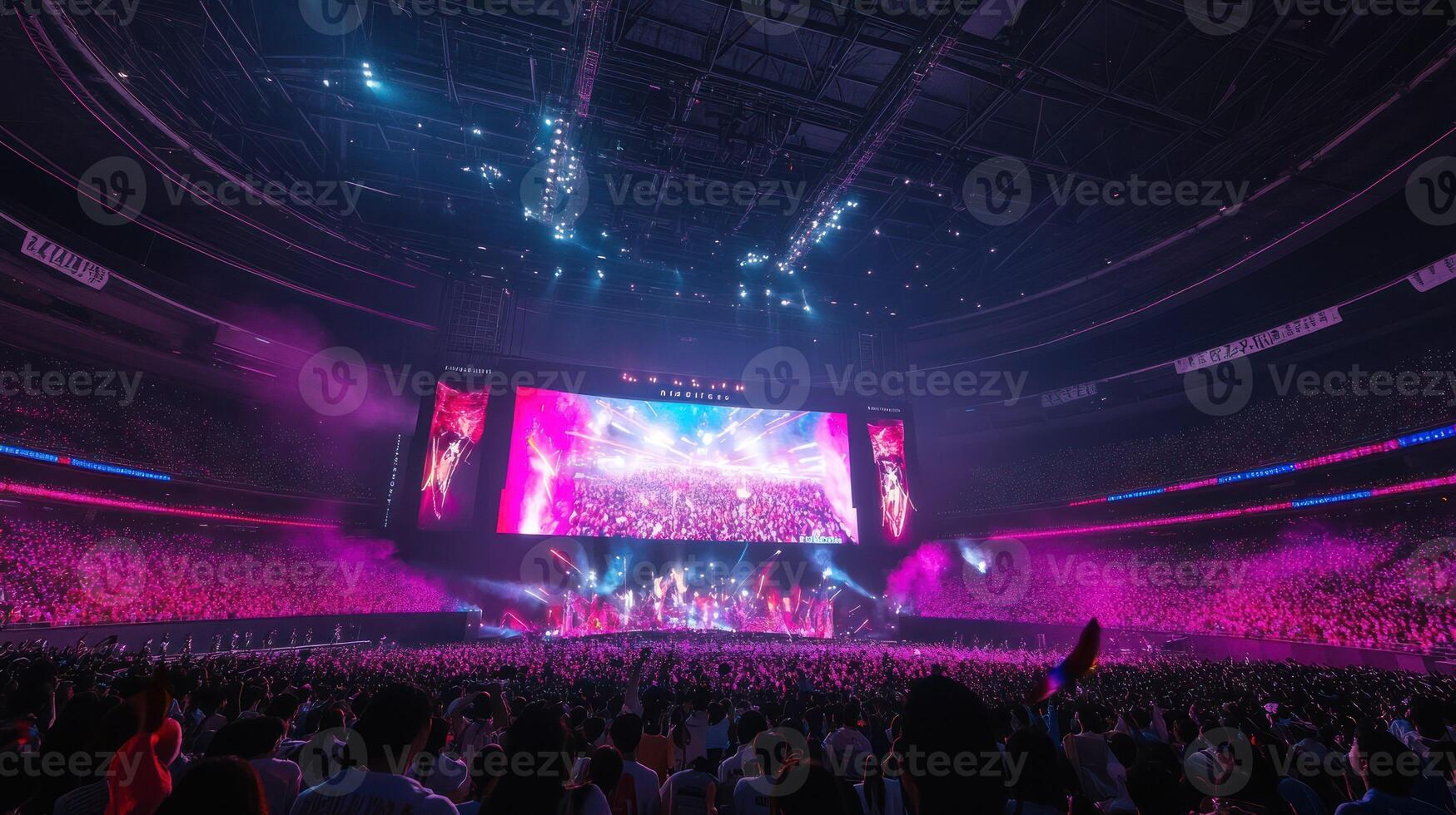 Vibrant concert atmosphere with a large crowd enjoying a performance. photo