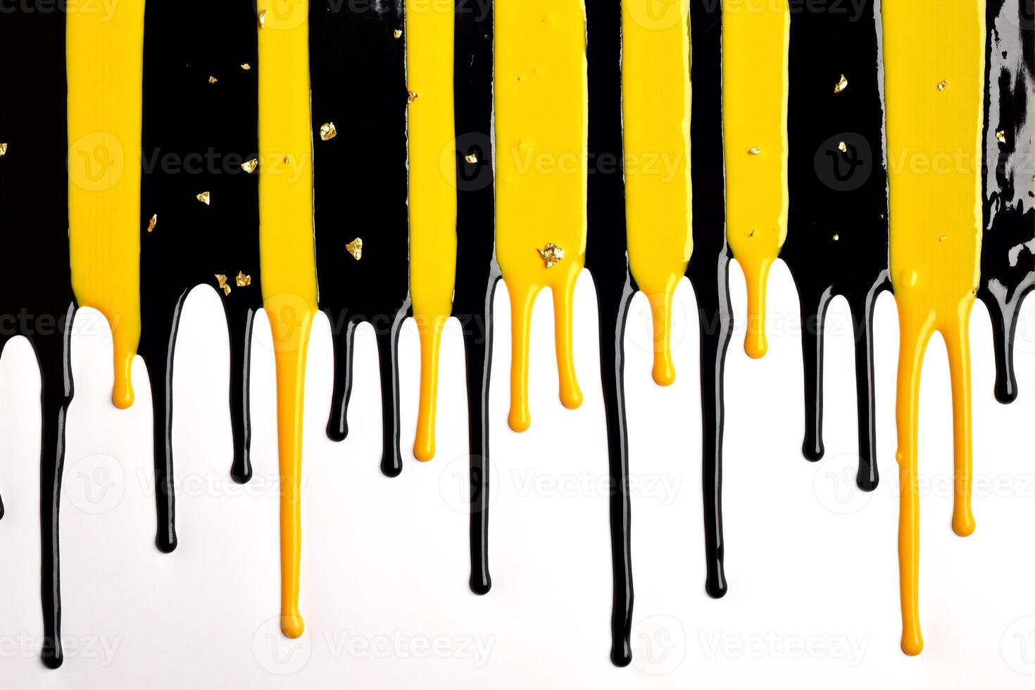 A black and yellow paint drip on a white surface photo