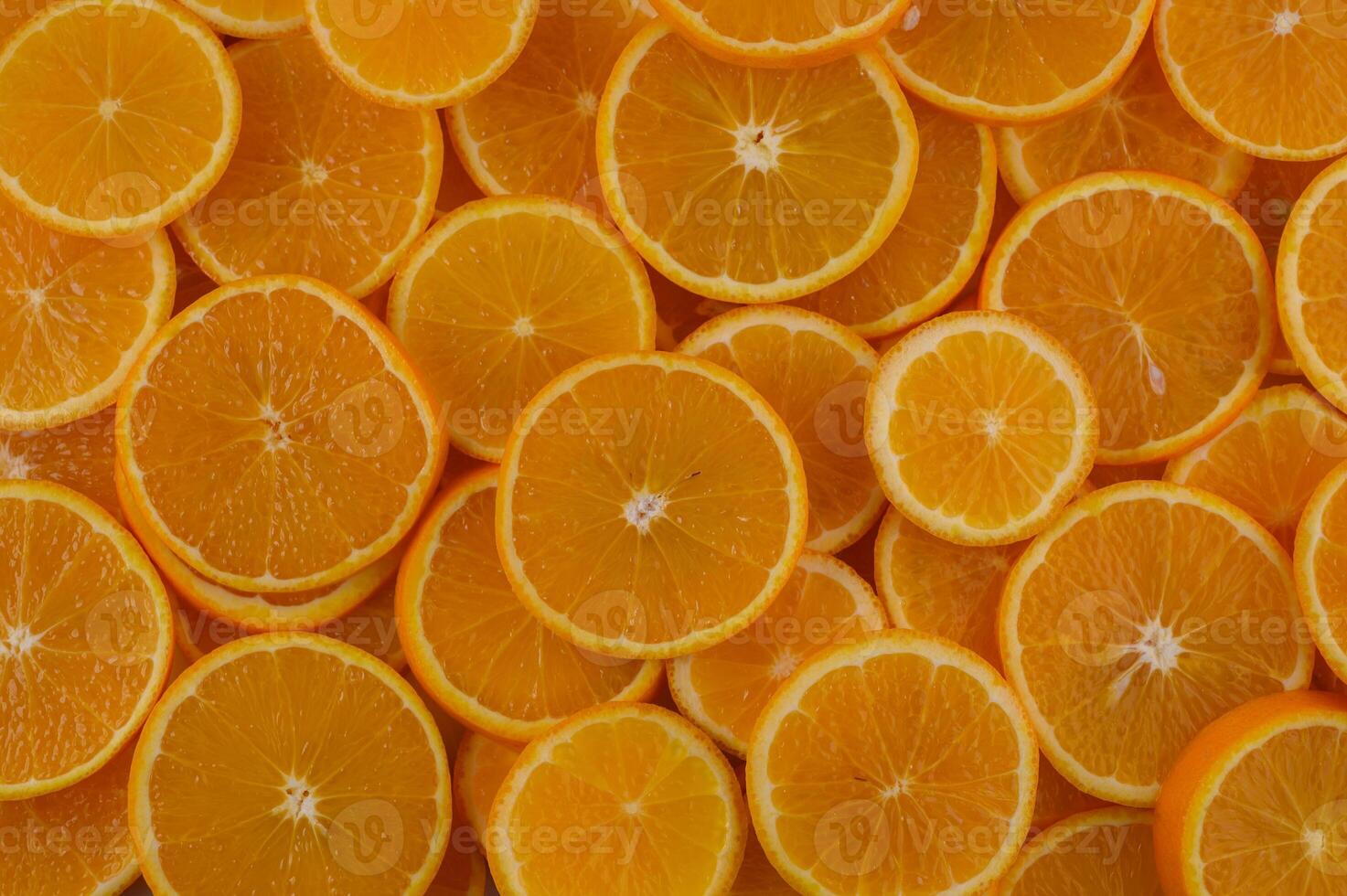 Vibrant orange slices create a colorful display of freshness perfect for summer recipes and healthy snacks photo