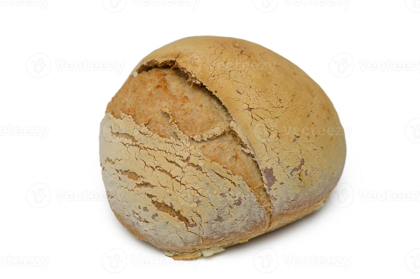 Rustic loaf of bread with cracked crust showcasing artisan baking techniques at dawn photo