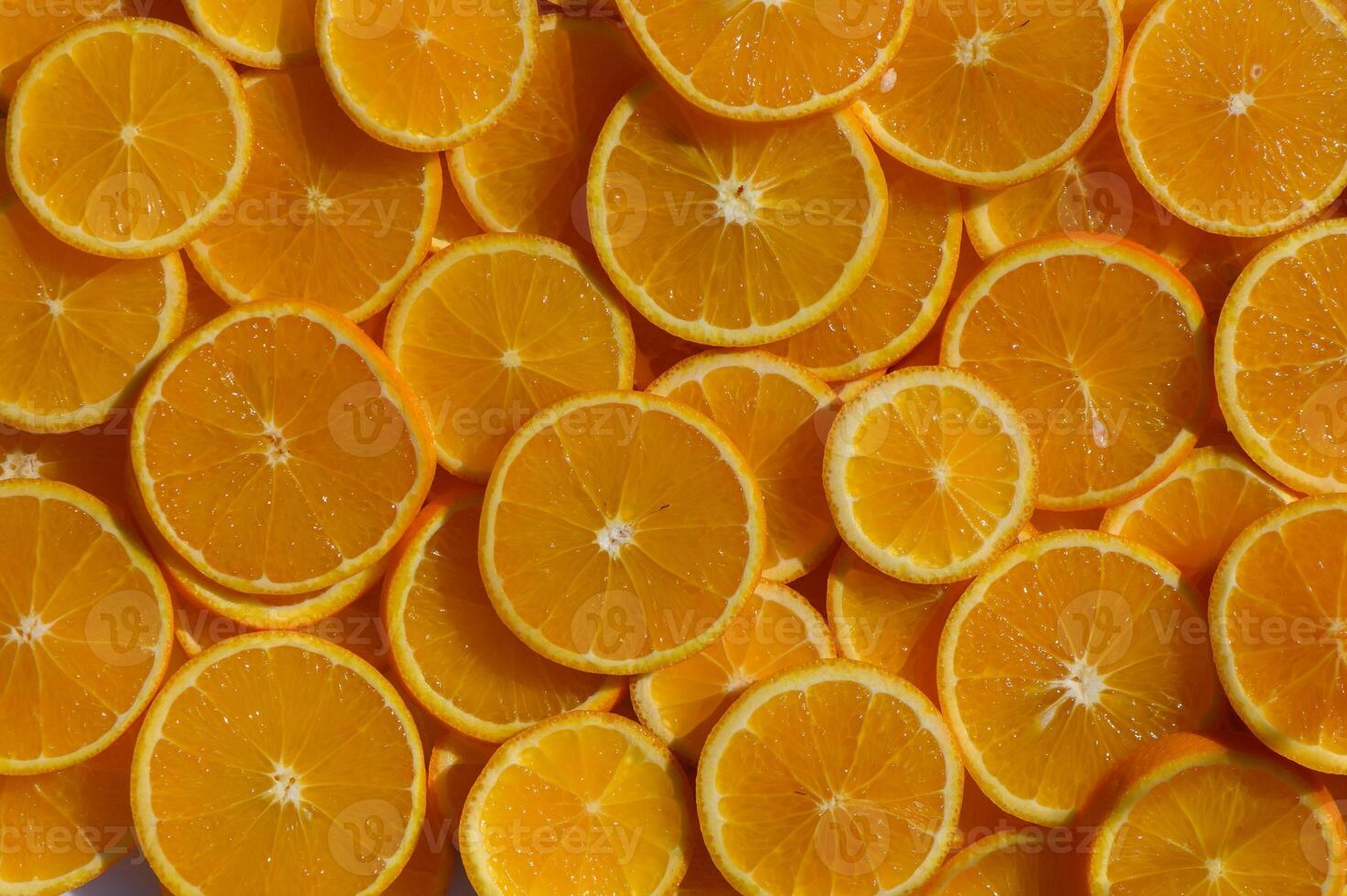 Bright citrus slices create a vibrant display of freshness and color in a summer kitchen setting photo