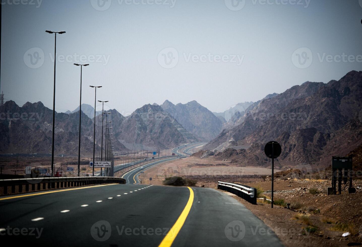 A highway with a sign on it photo