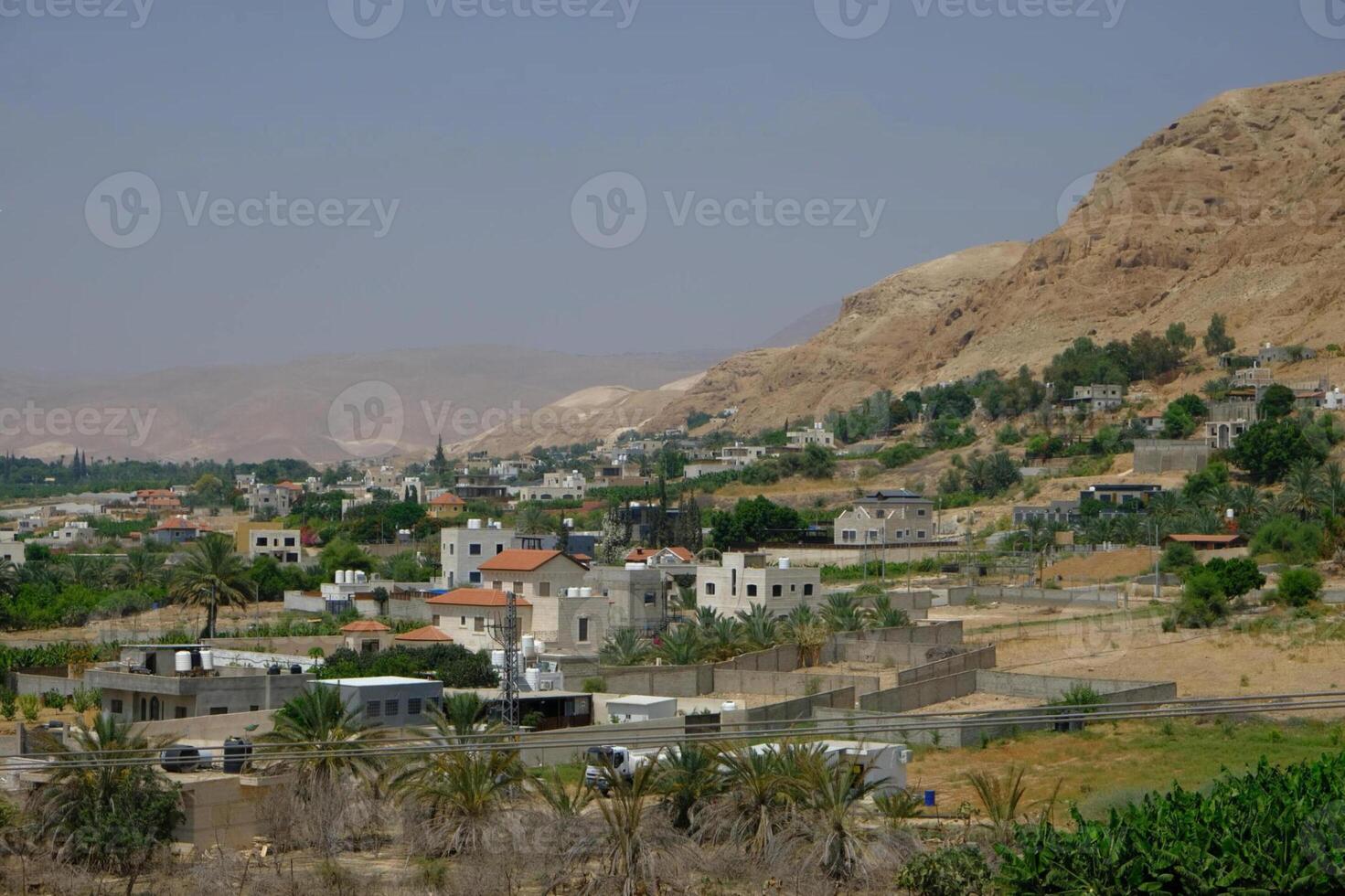 A view of the town of israel from the top of a hill photo