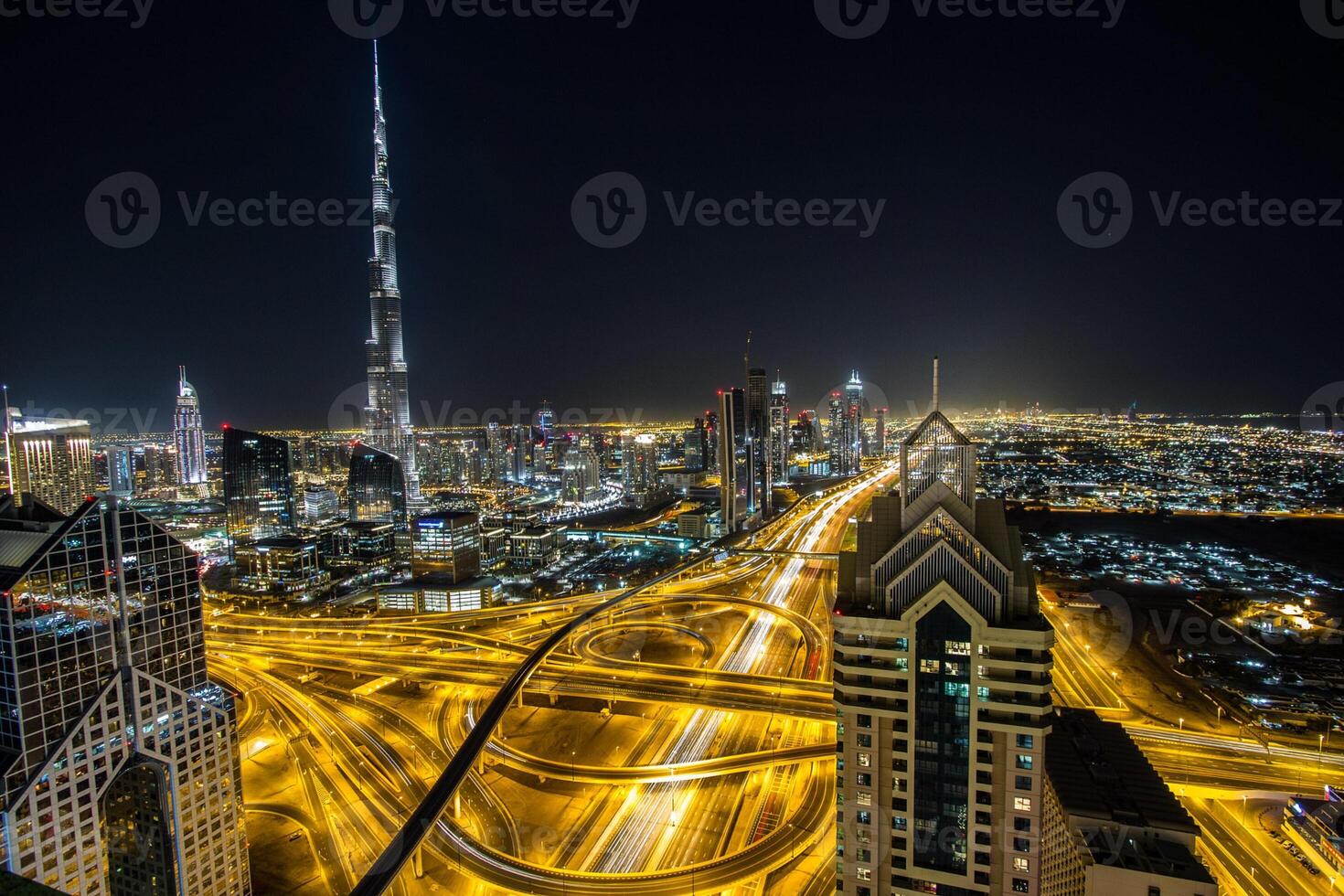 The city of dubai at night photo