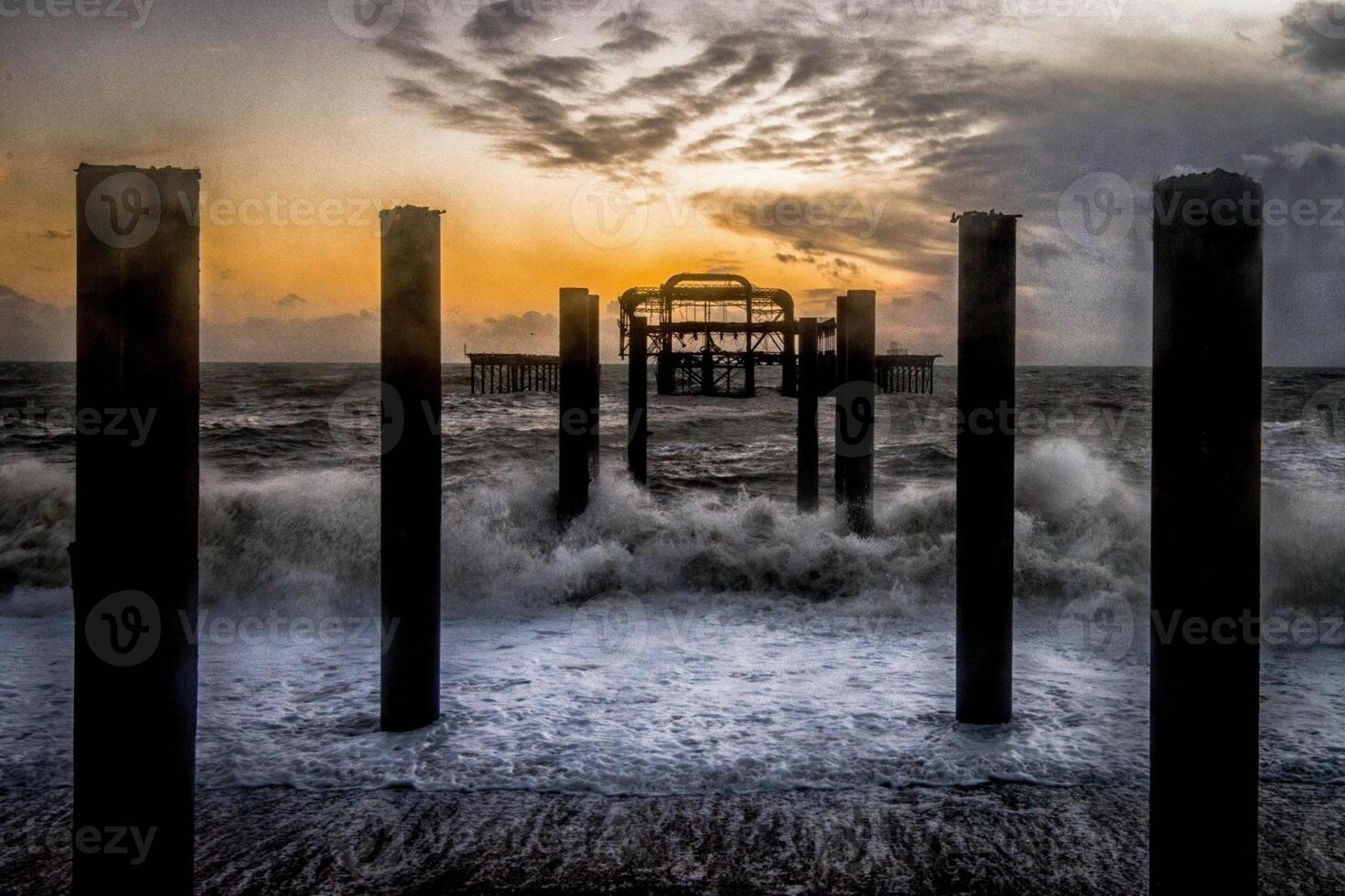 The pier at brighton, england, at sunset photo