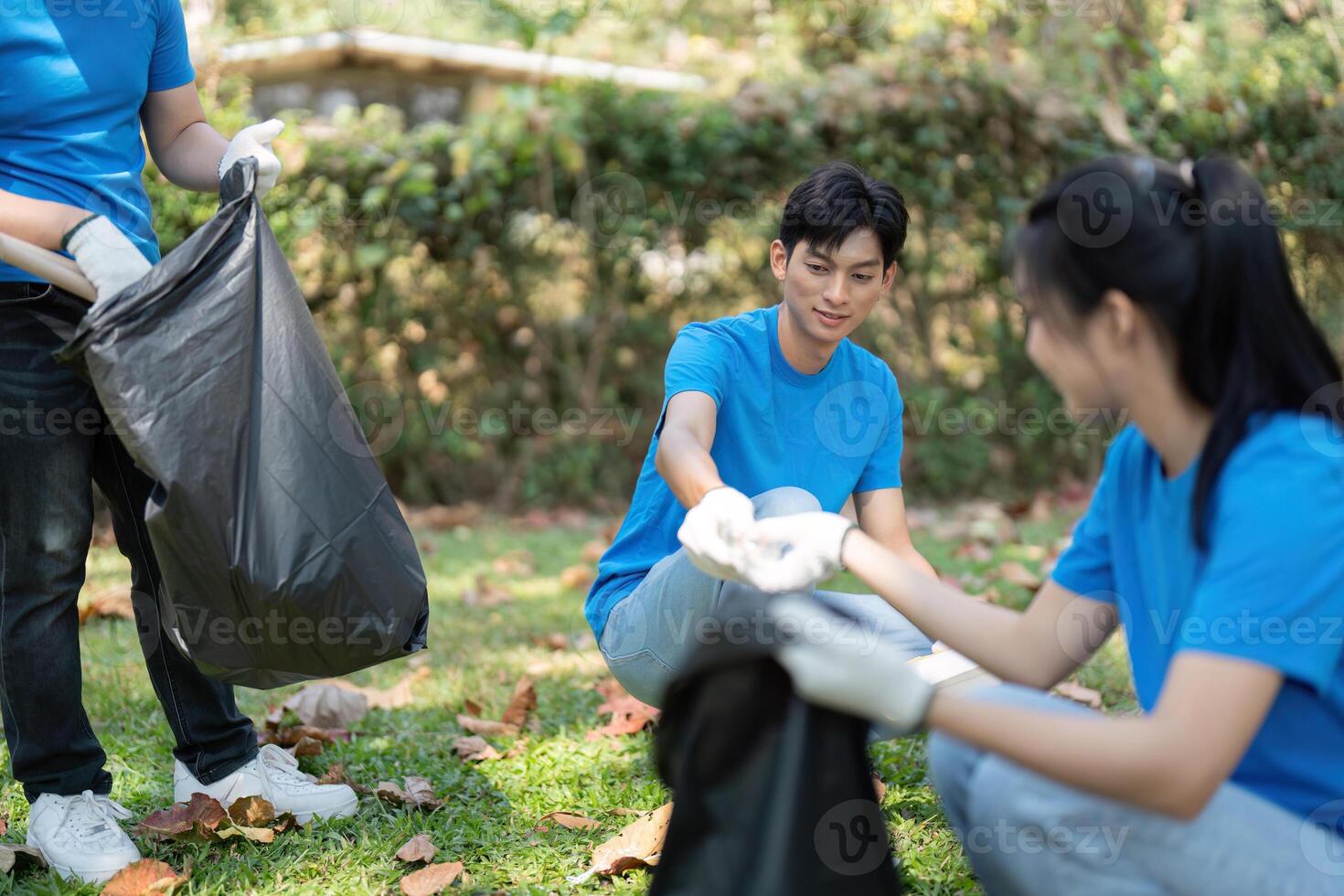 Youth Engagement and Community Service. Volunteers on the ground working diligently to clean up their local environment. photo
