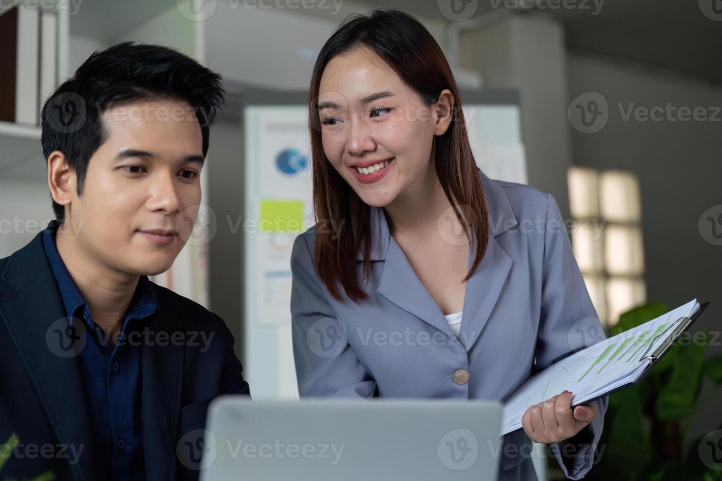 Collaboration and Networking. Professionals sharing insights and ideas during a working session. photo