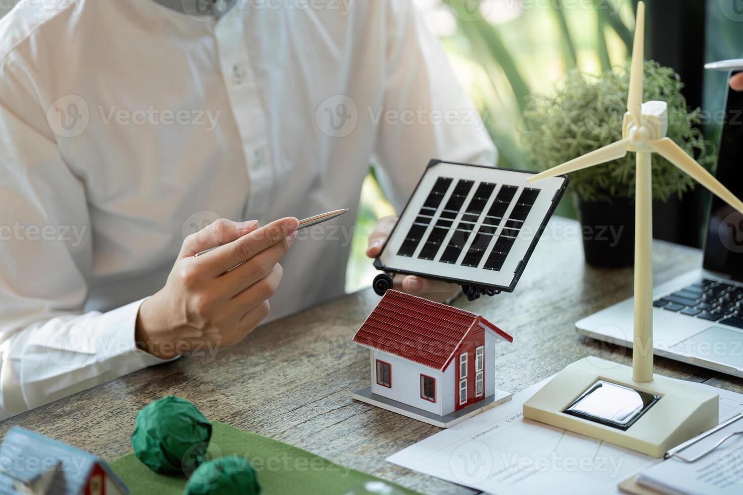 Renewable Energy and Innovative Solutions. Professionals showcasing solar technology in sustainable projects. photo