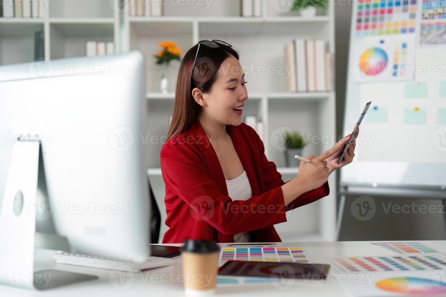 Engagement in Design and Technology. A designer showcasing digital content with excitement. photo