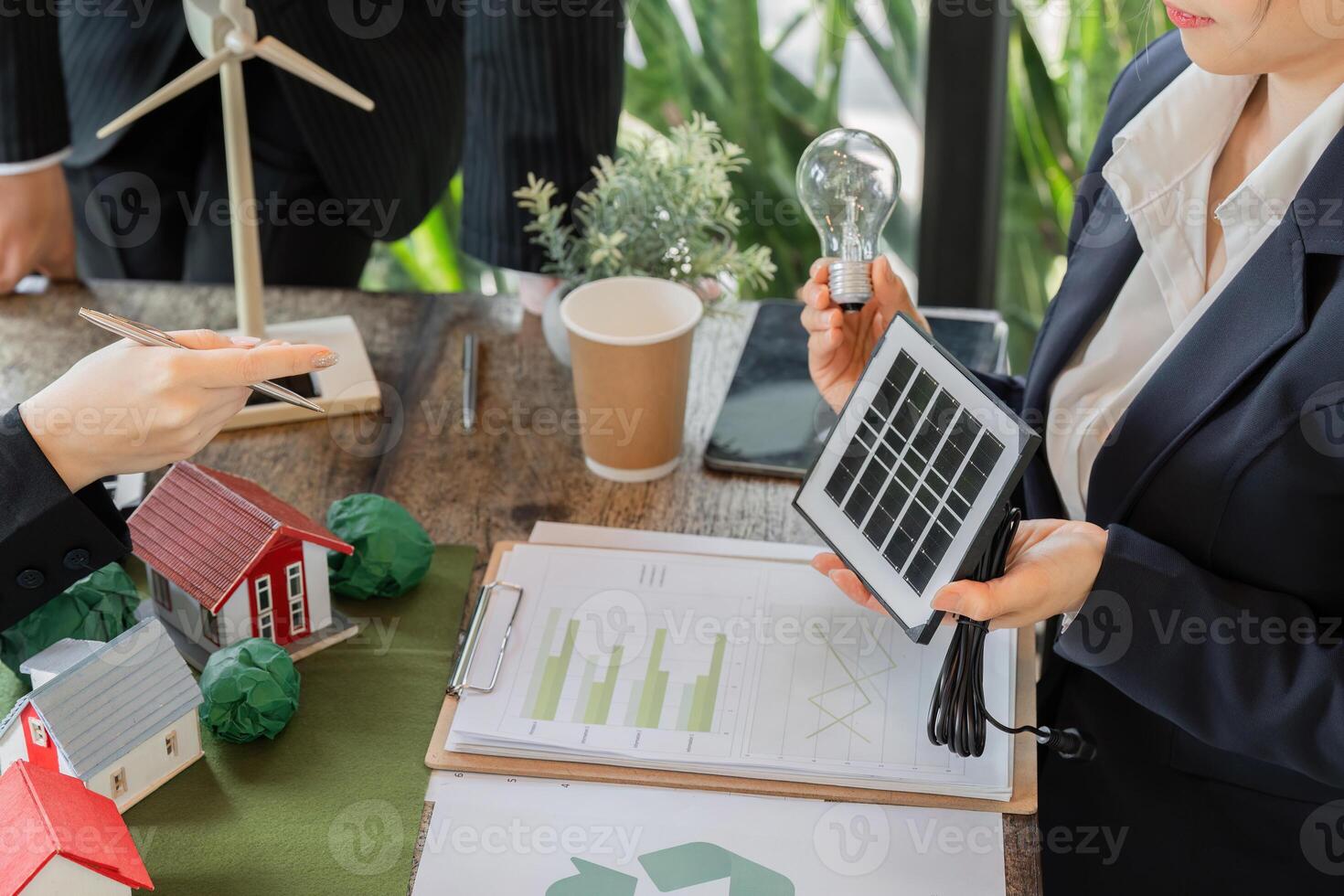 Innovation and Energy Conservation. Demonstrating renewable energy concepts with solar technology. photo