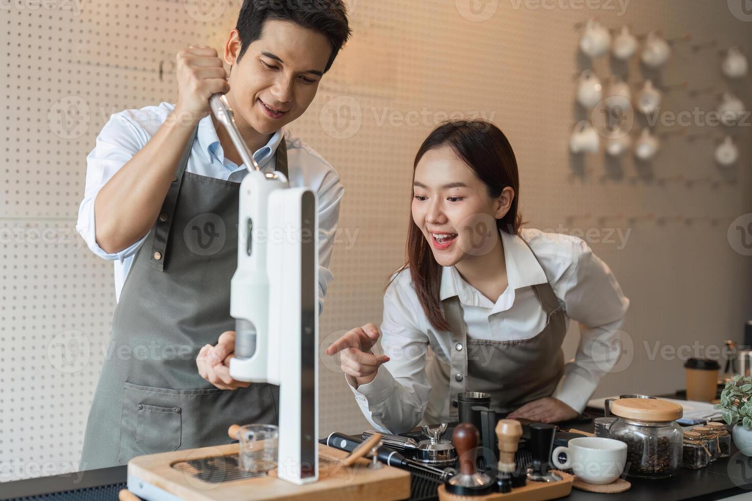 Entrepreneurship and Team Collaboration. Two entrepreneurs working together, excitedly experimenting with a coffee machine in a modern cafe setting. photo