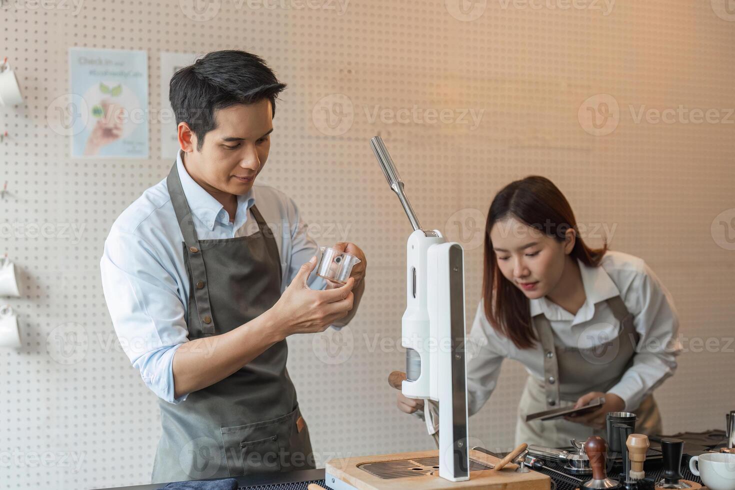 Sustainable Coffee Practices and Barista Collaboration. Two baristas engaging in sustainable coffee preparation using eco-friendly tools and techniques. photo