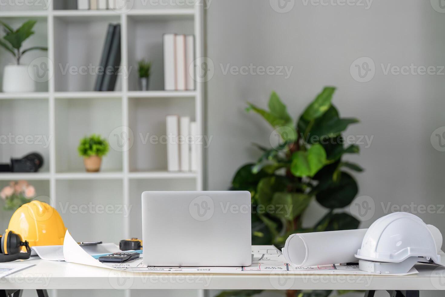 Workspace and Project Organization. An organized architectural workspace featuring tools and equipment for construction projects. photo