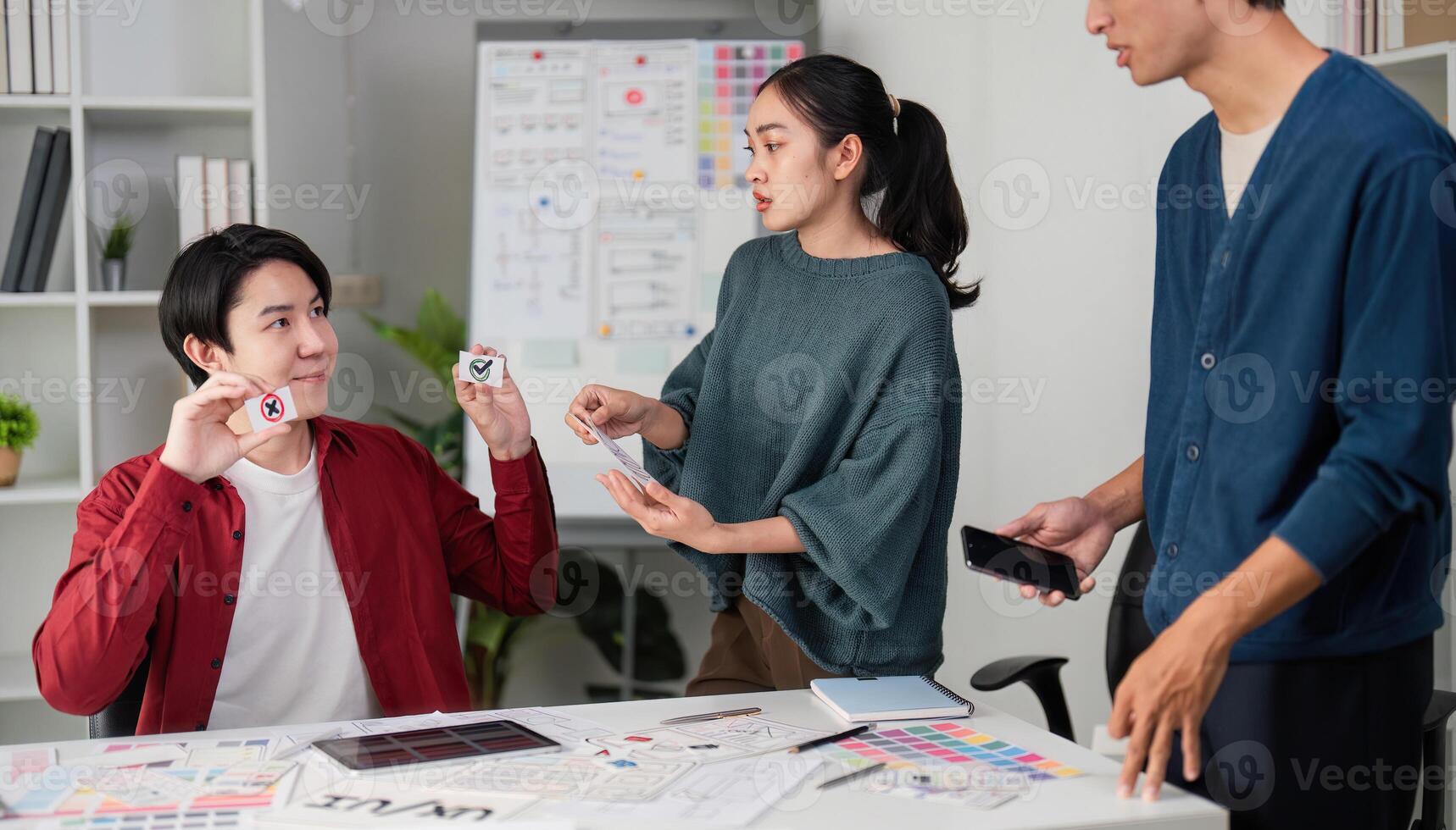 Team Collaboration and UI Design. A group brainstorming session focused on user experience and interface design. photo