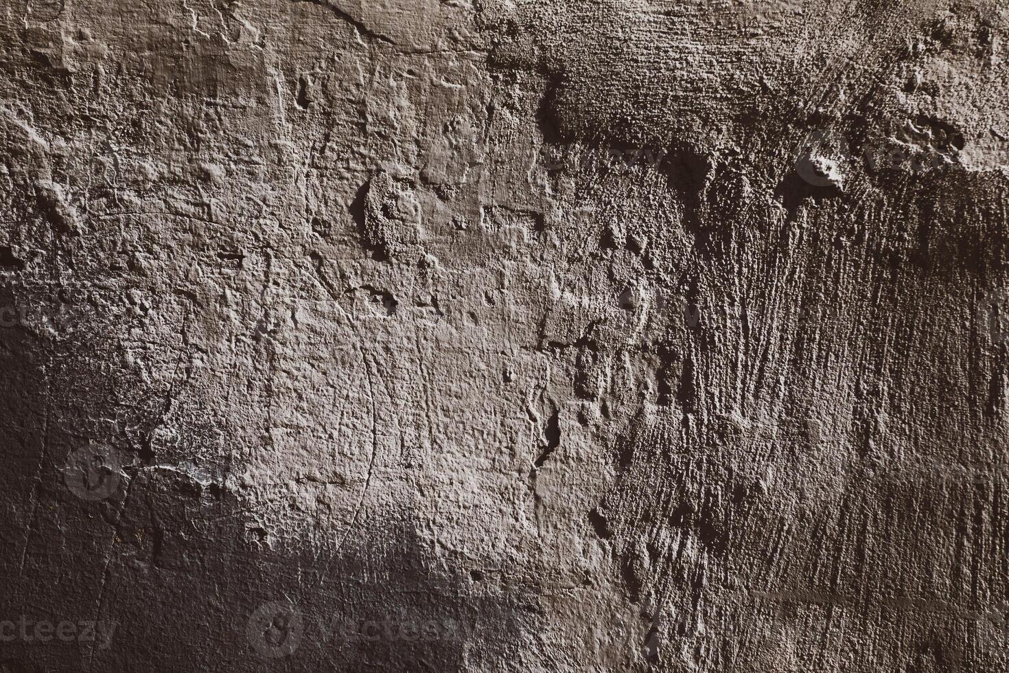 Tonal abstract with a heavily textured wall and a distressed surface that makes for a great backdrop. photo