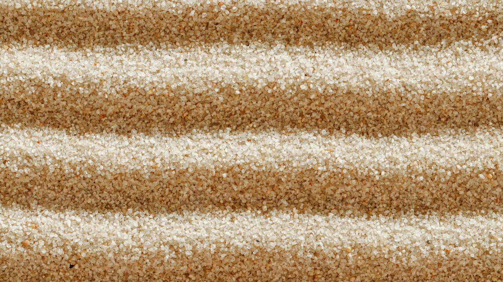 Top view banner in Japanese Zen Garden with close up lines pattern on sand, meditation and relaxation vibes. Aesthetic minimal sandy background with copy space, beige monochrome neutral tones photo