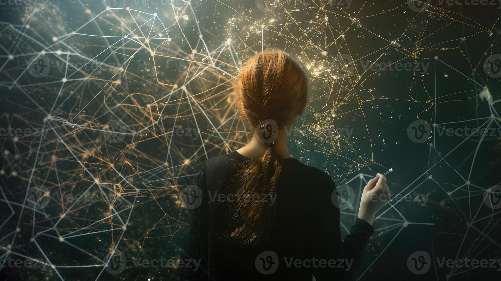 A woman is looking at a network of lines and dots photo