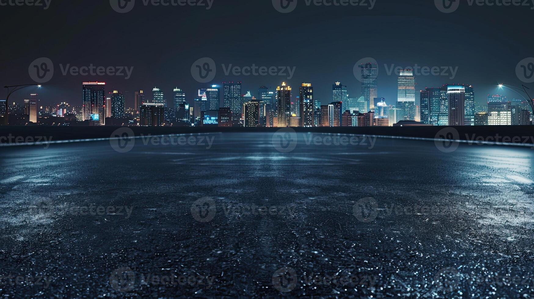 A cityscape at night with a wet road photo