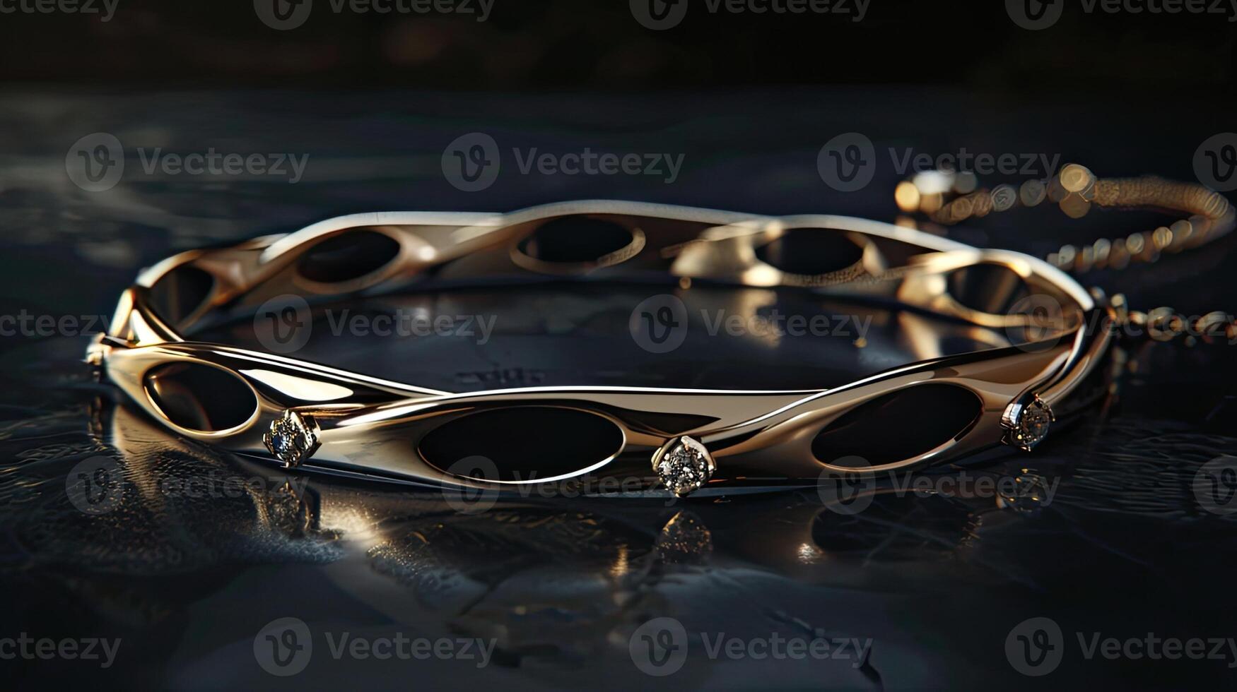 A gold bracelet with black stones on it photo
