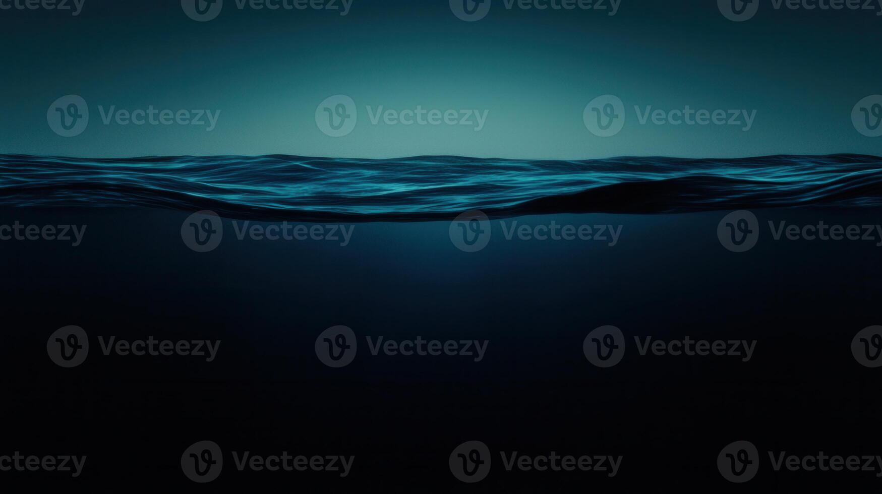 Serene Ocean Surface and Mysterious Deep A Stunning Underwater Contrast photo