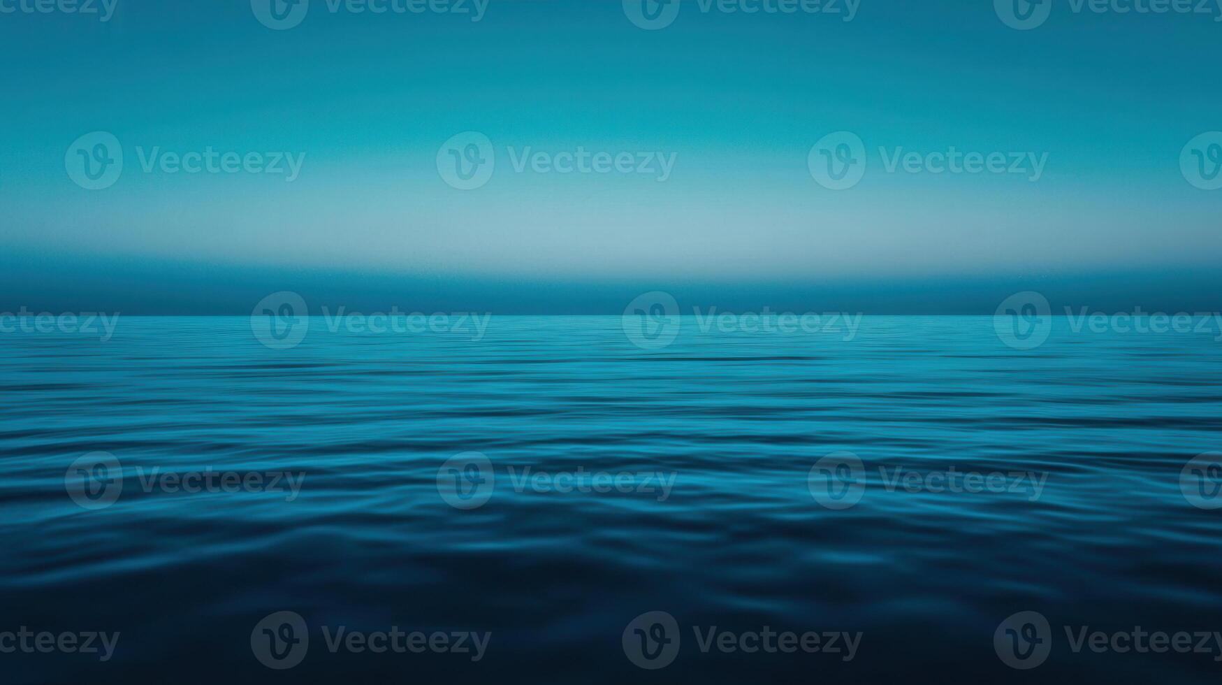Serene Ocean at Dusk Tranquil Water Surface Peaceful Blue Horizon photo