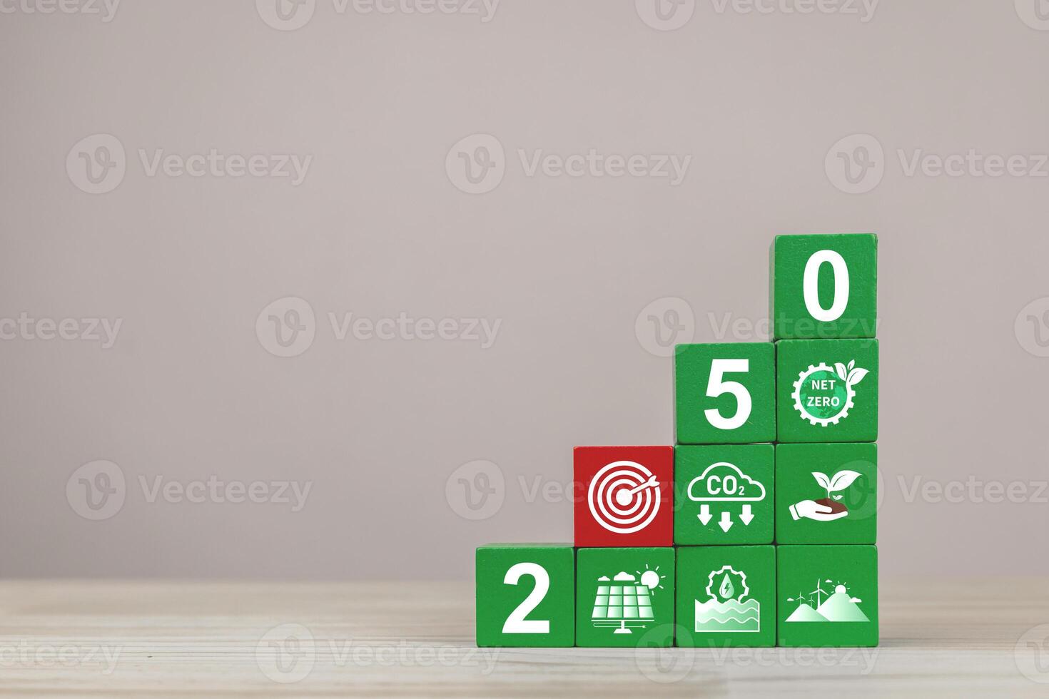 NETZERO in Year 2050. Green blocks with icons of concept sustainable and regenerative environment with a circular economy, green smart cities, and green technology powered by 100 percent clean energy. photo