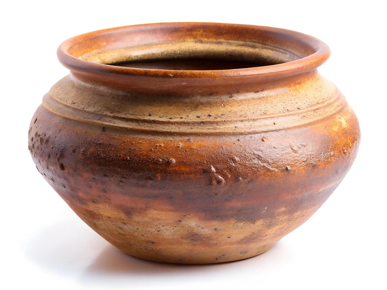 Handcrafted Earthen Pot with Smooth Clay Texture and Rustic Design on White Background photo