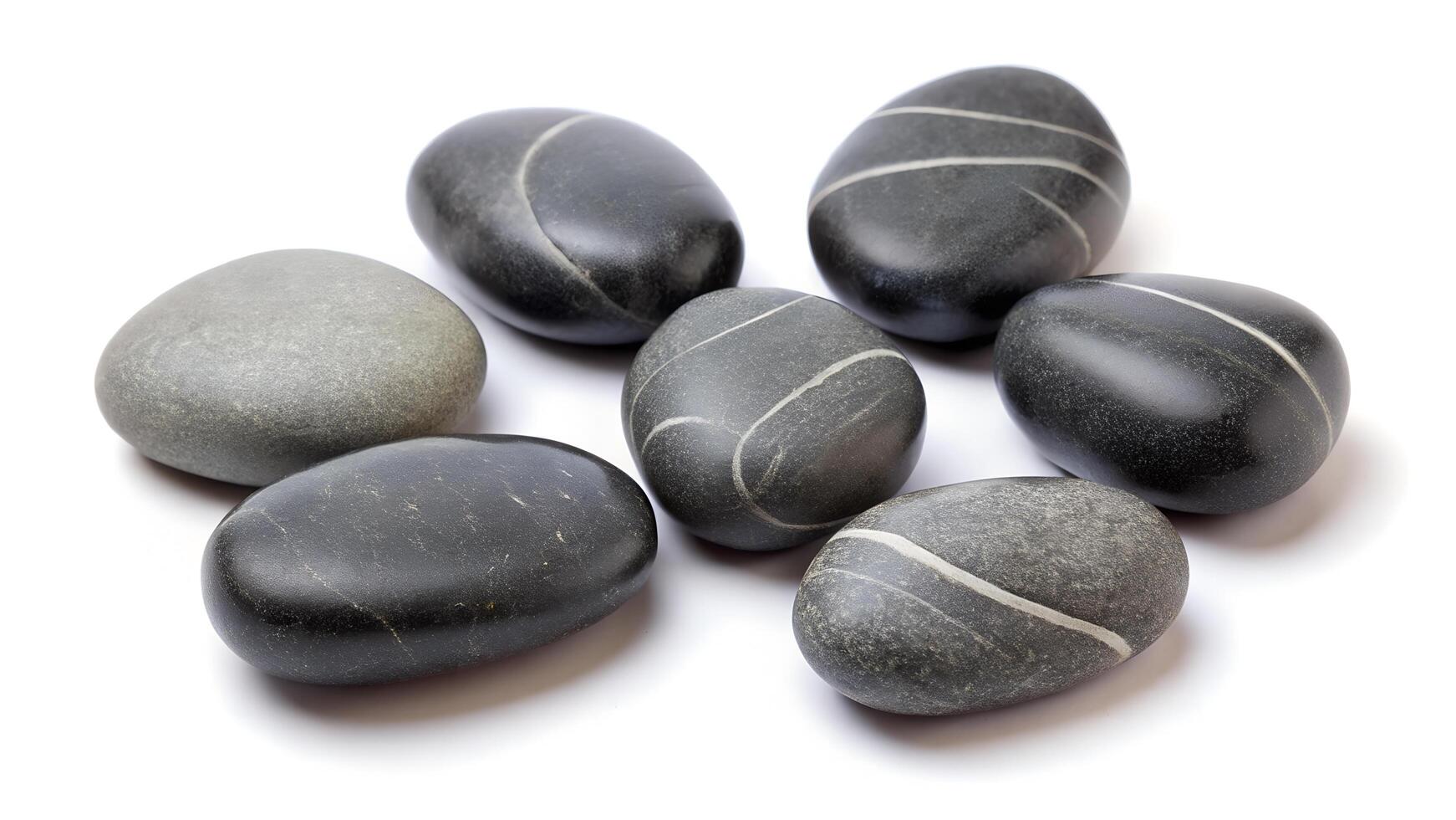 Smooth River Stones and Polished Pebbles in Zen Garden Arrangement with Soft Lighting on White Background photo