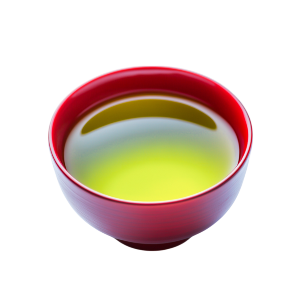 Vibrant Green Tea in Red Bowl with Smooth Surface and Reflective Glaze png