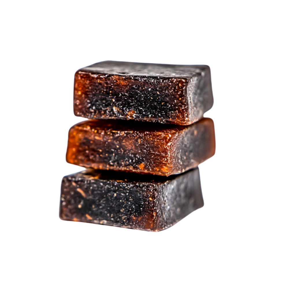 closeup of Three Layers of Chewy Dark Caramel Candy png