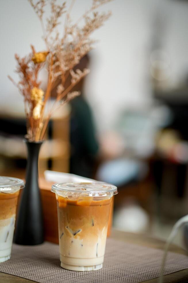 Glass of iced coffee in coffee shop, copy space and isolate concept. photo