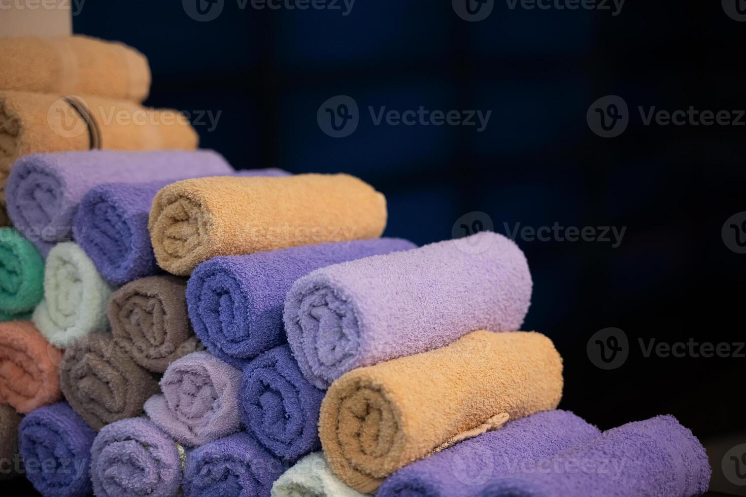 Neatly folded colorful towels arranged in a hospital room, providing comfort and hygiene for patients photo