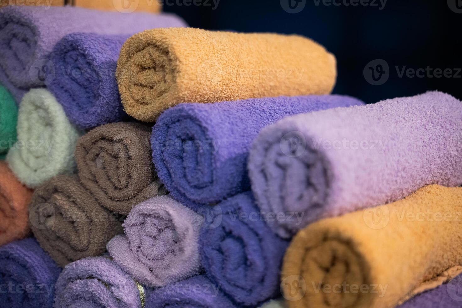 Neatly folded colorful towels arranged in a hospital room, providing comfort and hygiene for patients photo