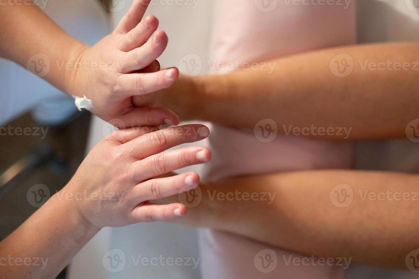 Foot Massage Therapy in a Relaxing Spa Setting. A professional massage therapist in a white uniform provides a soothing foot massage to a client in a calm and serene spa environment photo