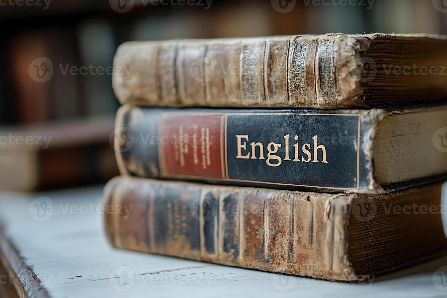 A stack of old, tattered books labeled English lies on a table in the book library. Generated by artificial intelligence photo