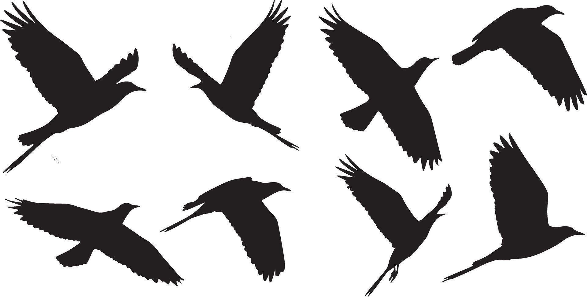 Set of black silhouettes of doves in flight. vector